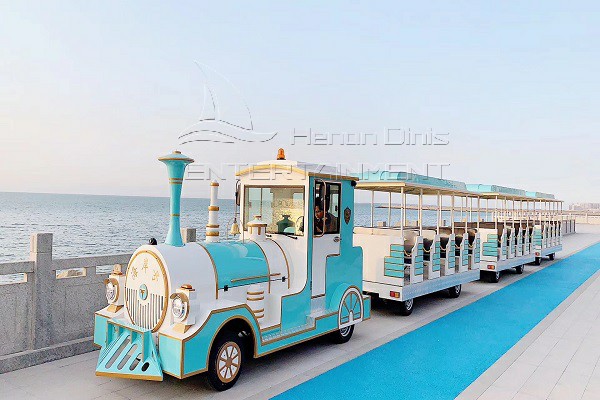 Drive Electric Trackless Train Along Coast